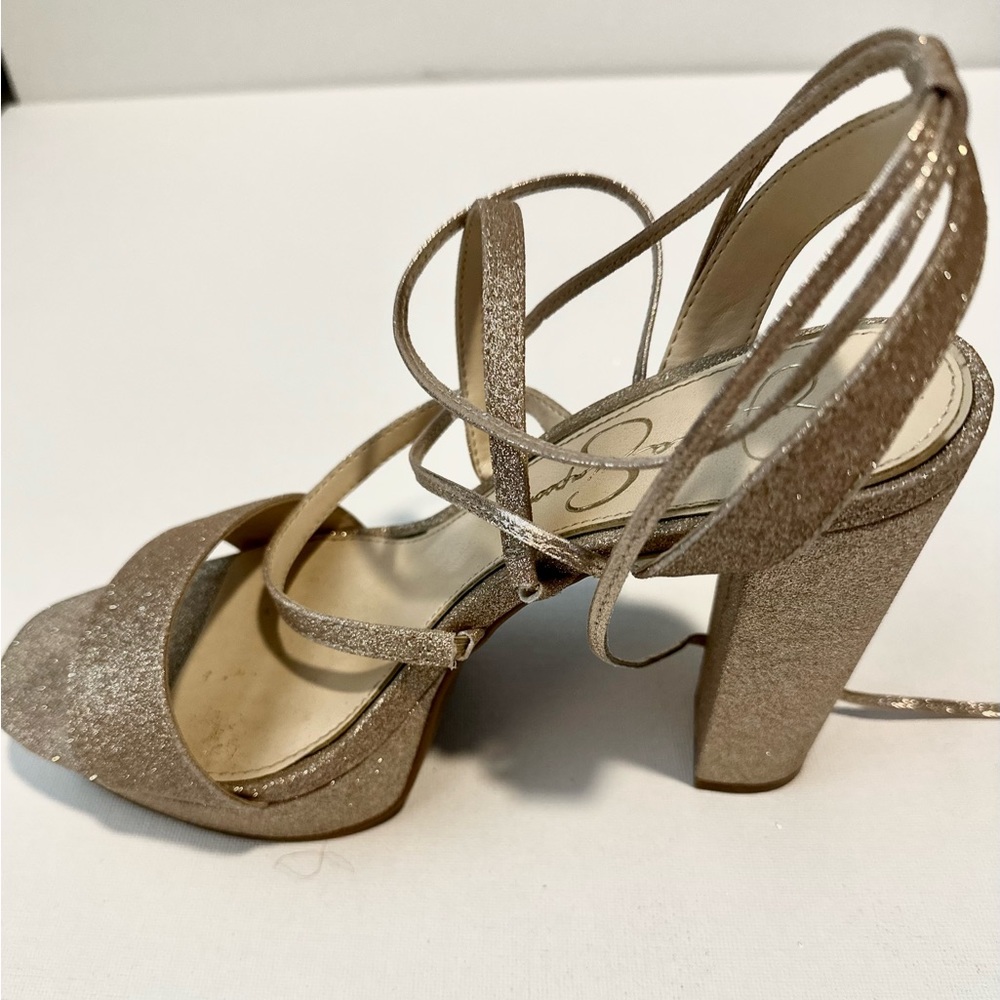 Jessica Simpson Gold platform lace up heels.